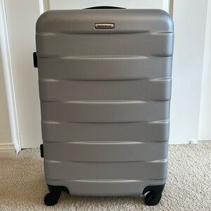 Samsonite Check In Luggage. Silver. 23”h x 26”w x 10”d. Expandable.